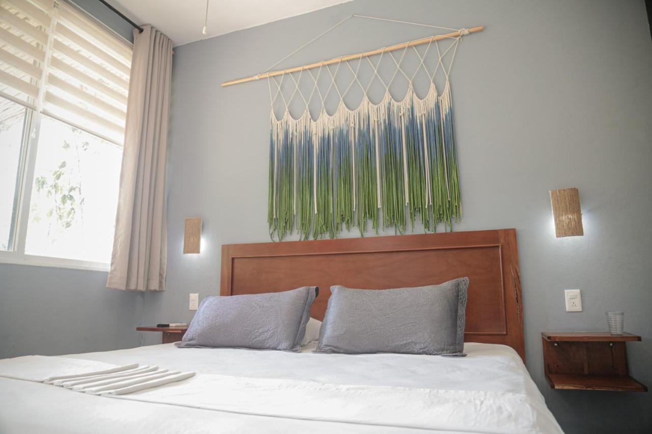 Hotel Makaabá Eco-Boutique Bacalar Exterior foto A wall hanging