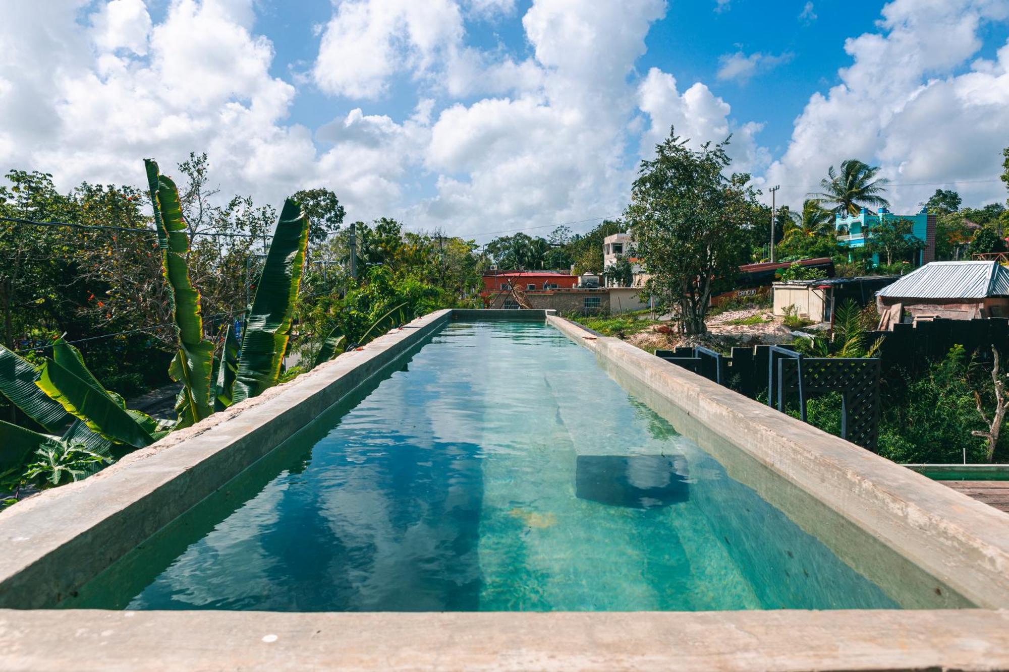 Hotel Makaabá Eco-Boutique Bacalar Exterior foto Swimming pool at the hotel